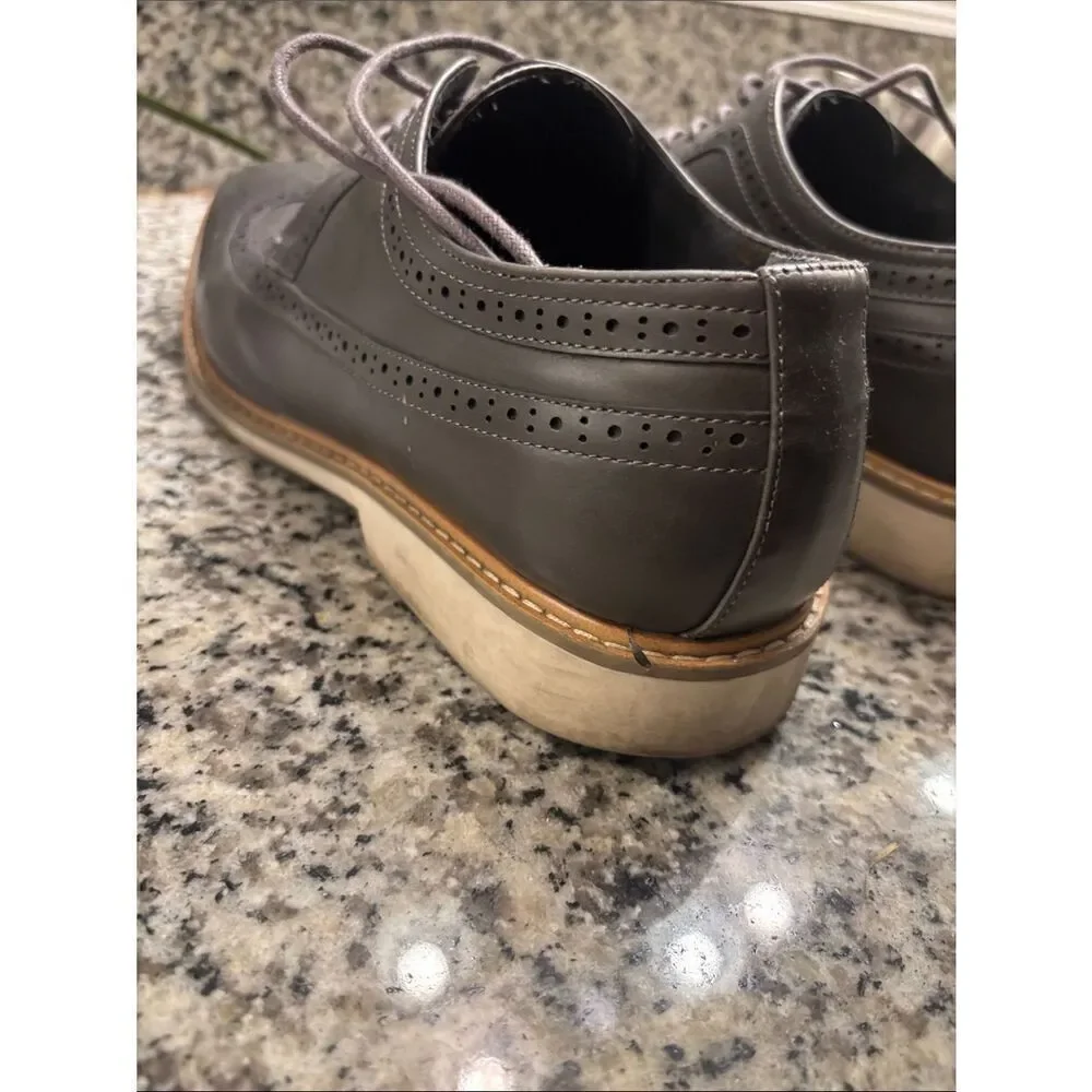 Unlisted by Kenneth Cole Men's Black Leather Wingtip Oxfords with Tan Welt